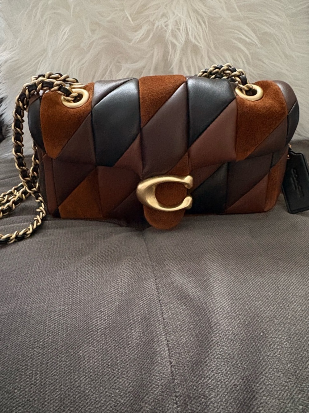 Coach Quilted Patchwork Shoulder Bag in Brown and Black Suede.
Tabby 20
